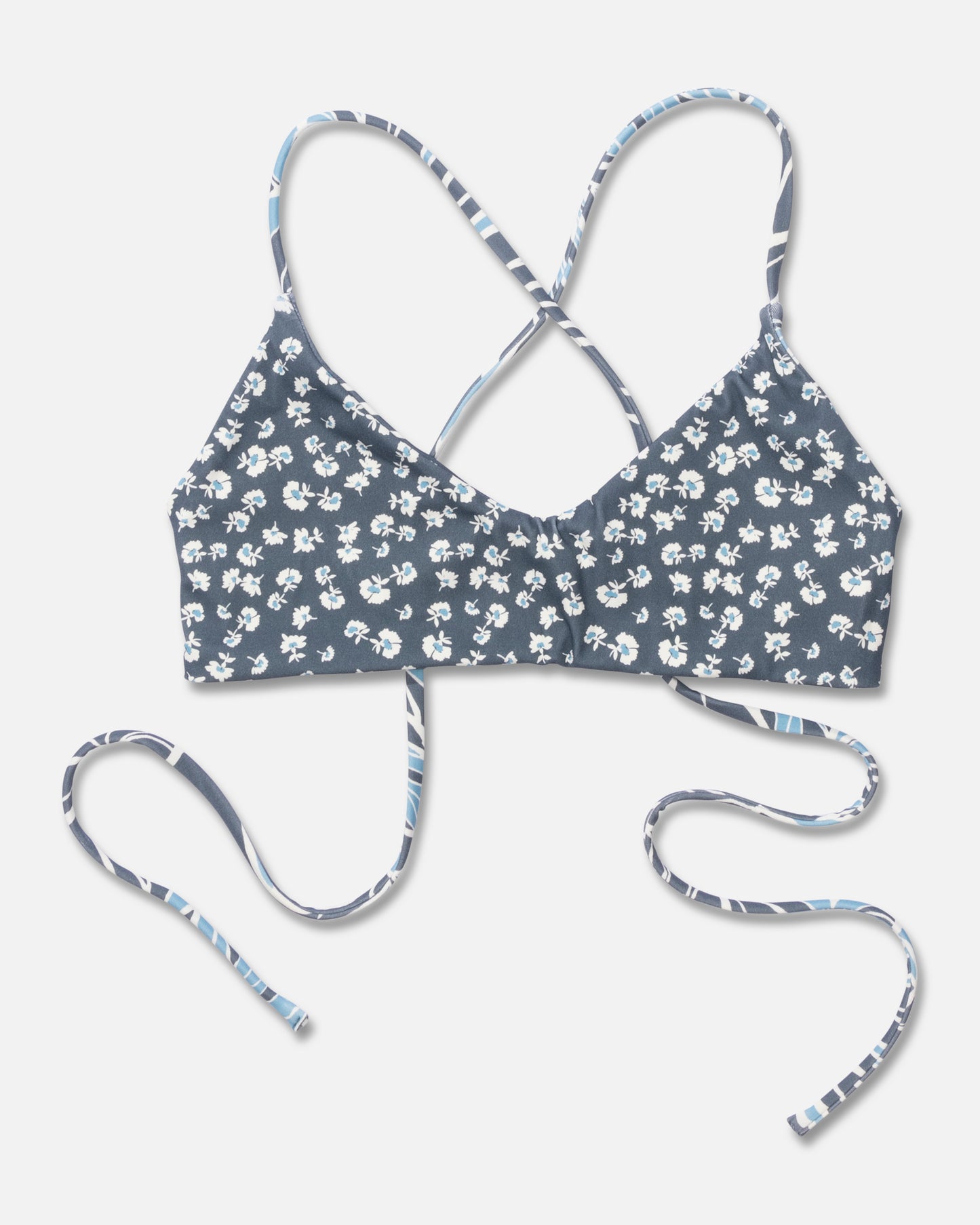 Studio image of the front of the Rattan Palms Reversible Bralette Top - Fin Blue.