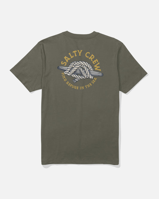 The Salty Crew Cleat Knott Tee in Dusty Olive is a cotton t-shirt with a screenprinted knotted rope graphic on the back, “SALTY CREW” above, and “FIND REFUGE IN THE SEA” below in yellow and beige lettering.