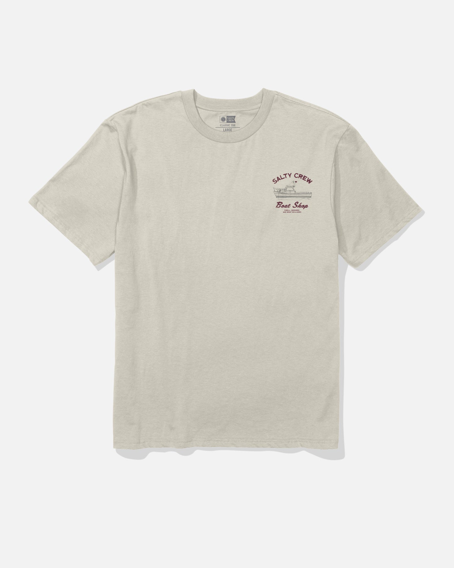 The Salty Crew Boat Shop Classic Tee - Bone is a light beige short-sleeve 100% cotton t-shirt with maroon “SALTY CREW, Boat Shop, Venice, CA.” text on the left chest, shown laid flat on a white background.