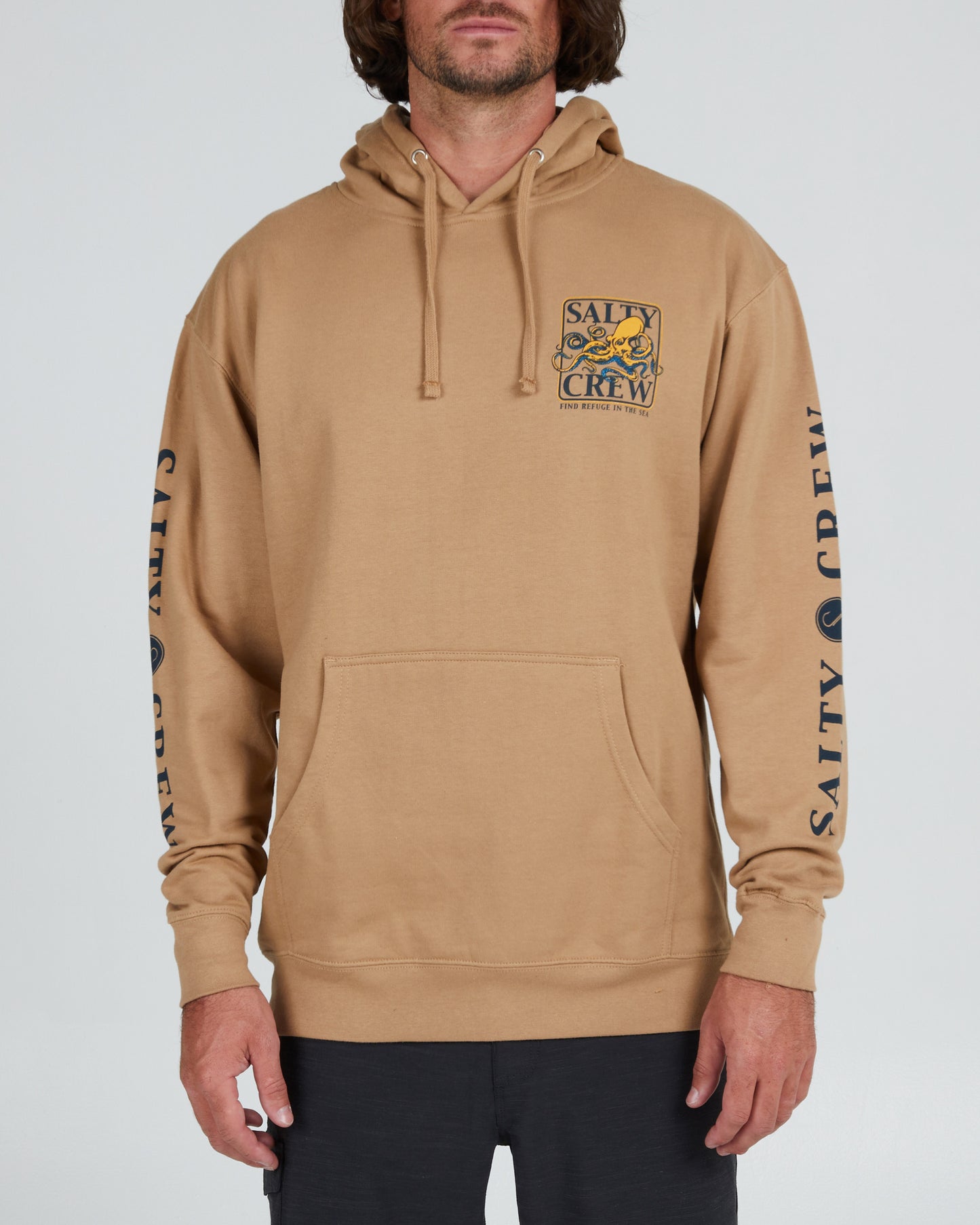 On body front of the Ink Slinger Sandstone Hood fleece