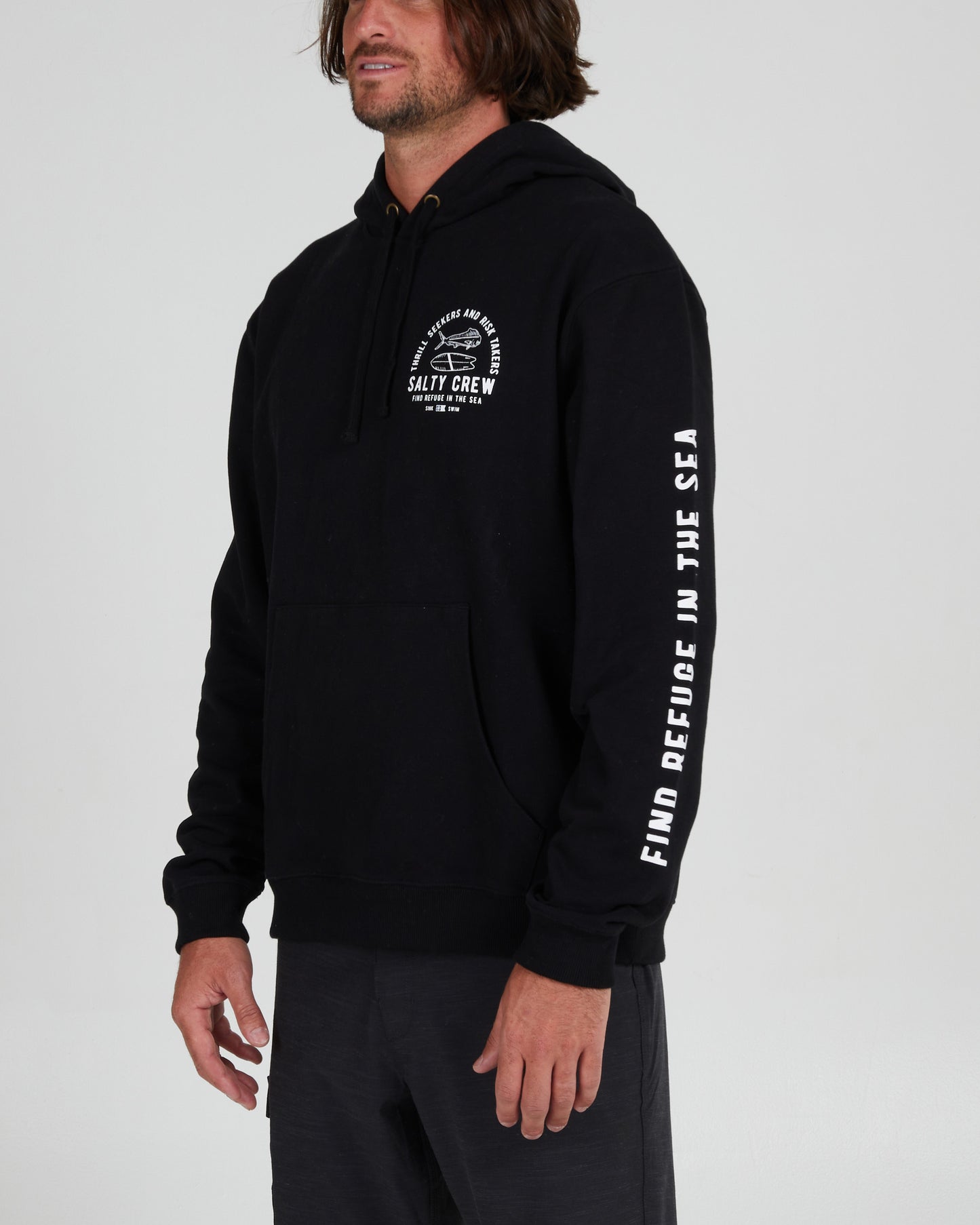 On body front angled view of the Lateral Line Black Hooded Fleece