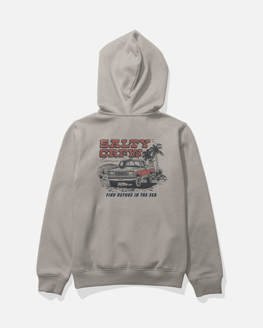 The Salty Crew Truck Stop Boys Fleece in Stone is a light gray hooded hoodie with a kangaroo pocket and a back graphic of a classic truck, palm trees, and bold red "SALTY CREW" above “FIND REFUGE IN THE SEA.”.