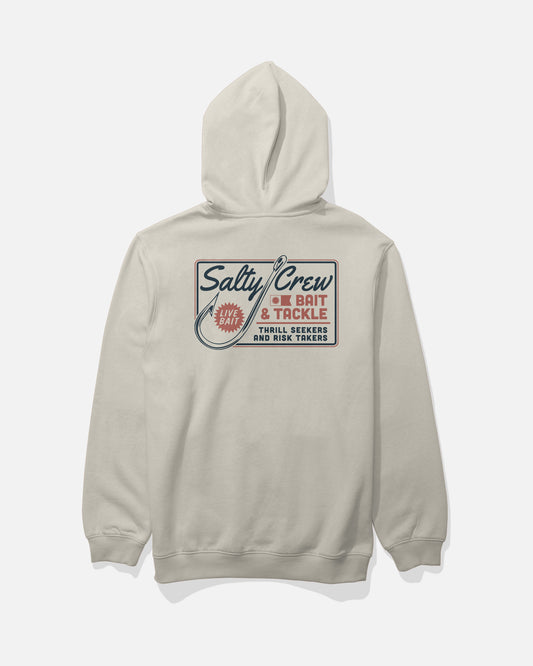 The Salty Crew Hooked Up Fleece - Bone is a beige cotton-polyester hoodie featuring a back graphic with “Salty Crew Bait & Tackle” and “Thrill Seekers and Risk Takers” in blue and red lettering, along with a hook design and a small Live Bait circle. It’s finished with a drawcord hood and classic kangaroo pocket for comfort.