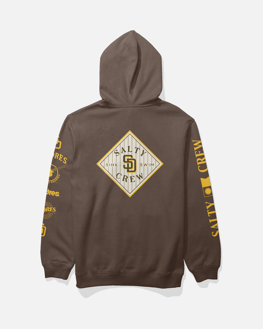 The Padres Tippet Fleece - Brown by Salty Crew is displayed from the back, showcasing a diamond-shaped logo on the center back and yellow San Diego Padres and Salty Crew branding printed down both sleeves against a solid light background.