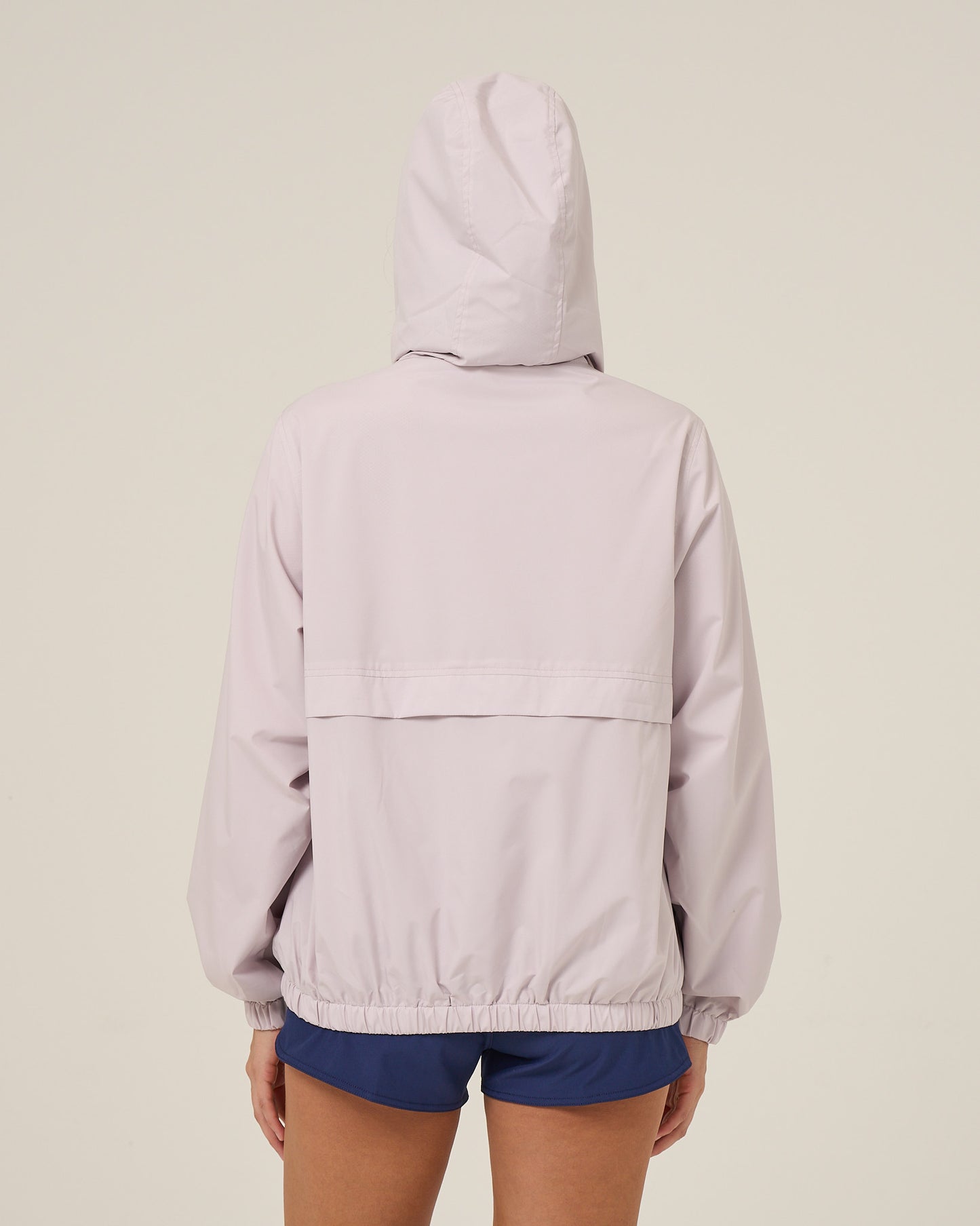 Back view of the Barrier Windbreaker - Lilac Fog.