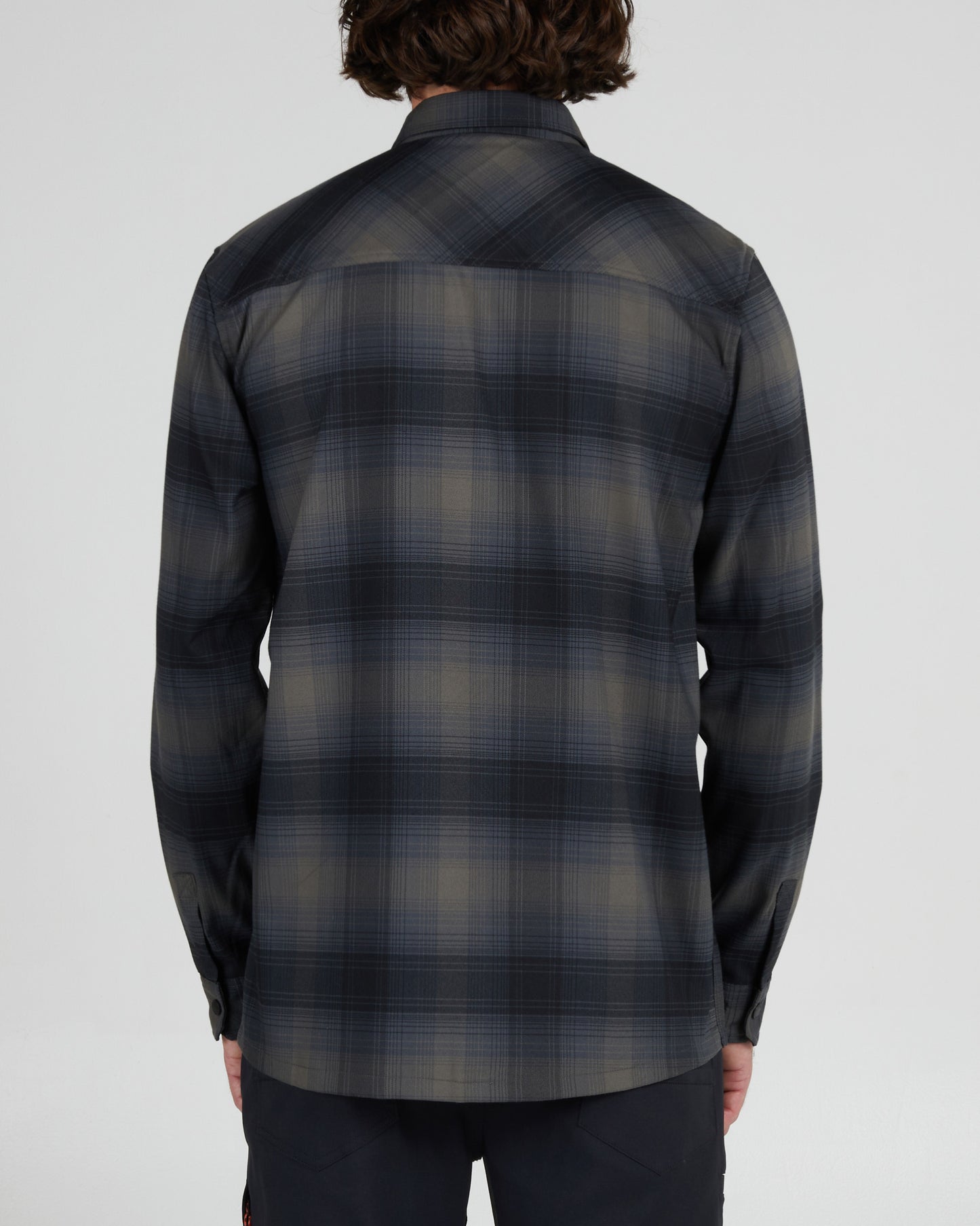 On body back of the Fathom Black Tech Flannel