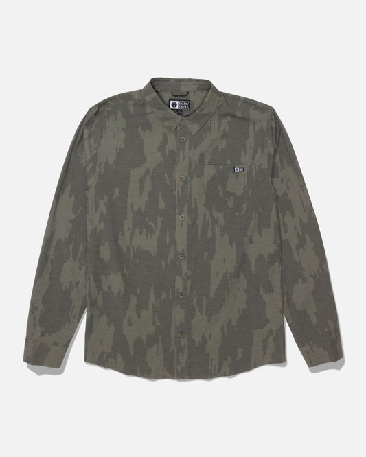 The Salty Crew Drifter Long Sleeve UV Button Up - Ranger is a green and brown camo button-up shirt, shown laid flat on a white background. It features a chest pocket with a small black label, and is crafted from quick dry fabric for all-day comfort. With UPF 50+ sun protection, this shirt is ideal for outdoor adventures.