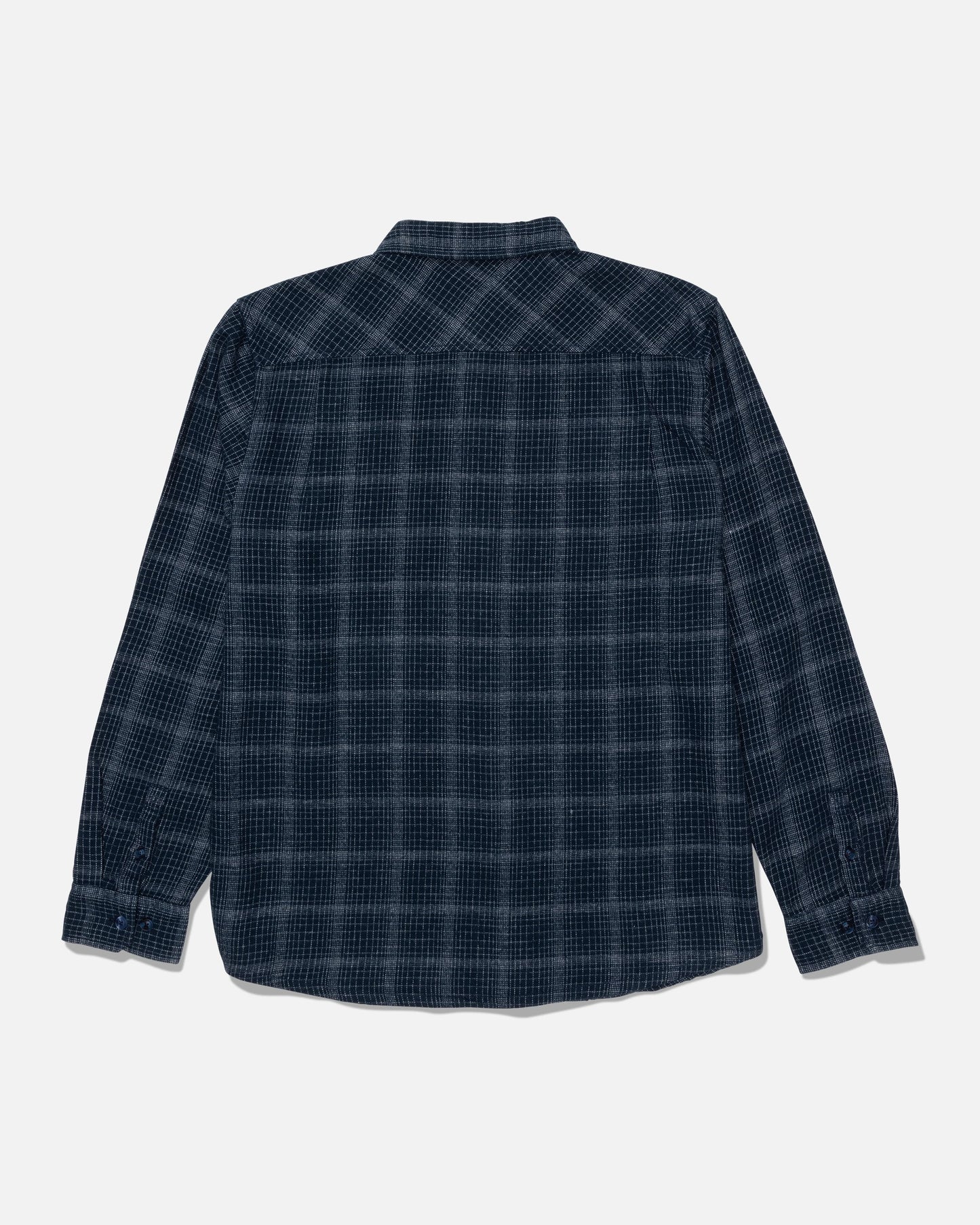 The Salty Crew Fine Line Flannel - Navy is displayed laid flat, viewed from the back against a plain white background. This long-sleeve, button-up shirt features a dark blue and black plaid pattern in soft cotton flannel.