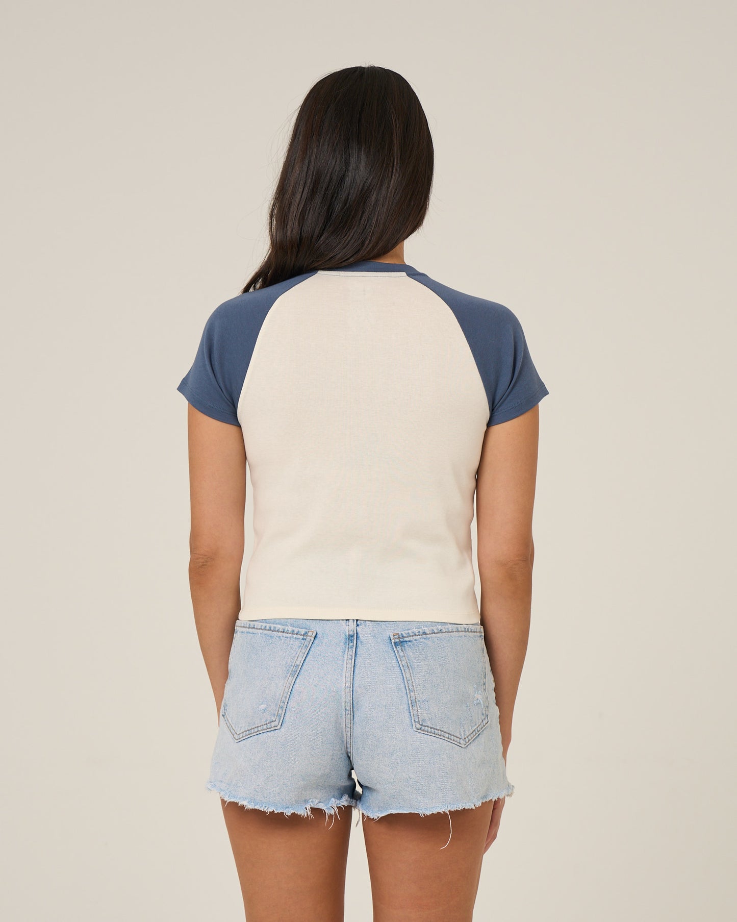 Back view of the Drive To The Sea Raglan Tee - Indigo.