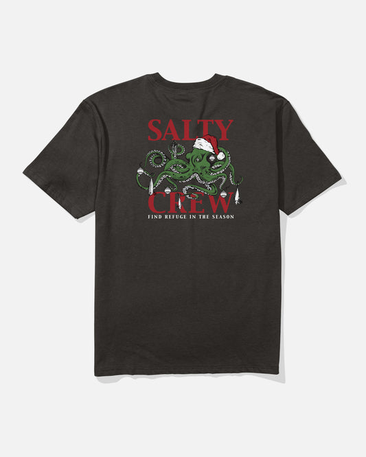 The Salty Crew Inkmas Holiday Tee - Black is a 100% cotton shirt with a green Santa-hat octopus and festive “SALTY CREW FIND REFUGE IN THE SEASON” print—perfect for celebrating Holiday 2025 Inkmas.