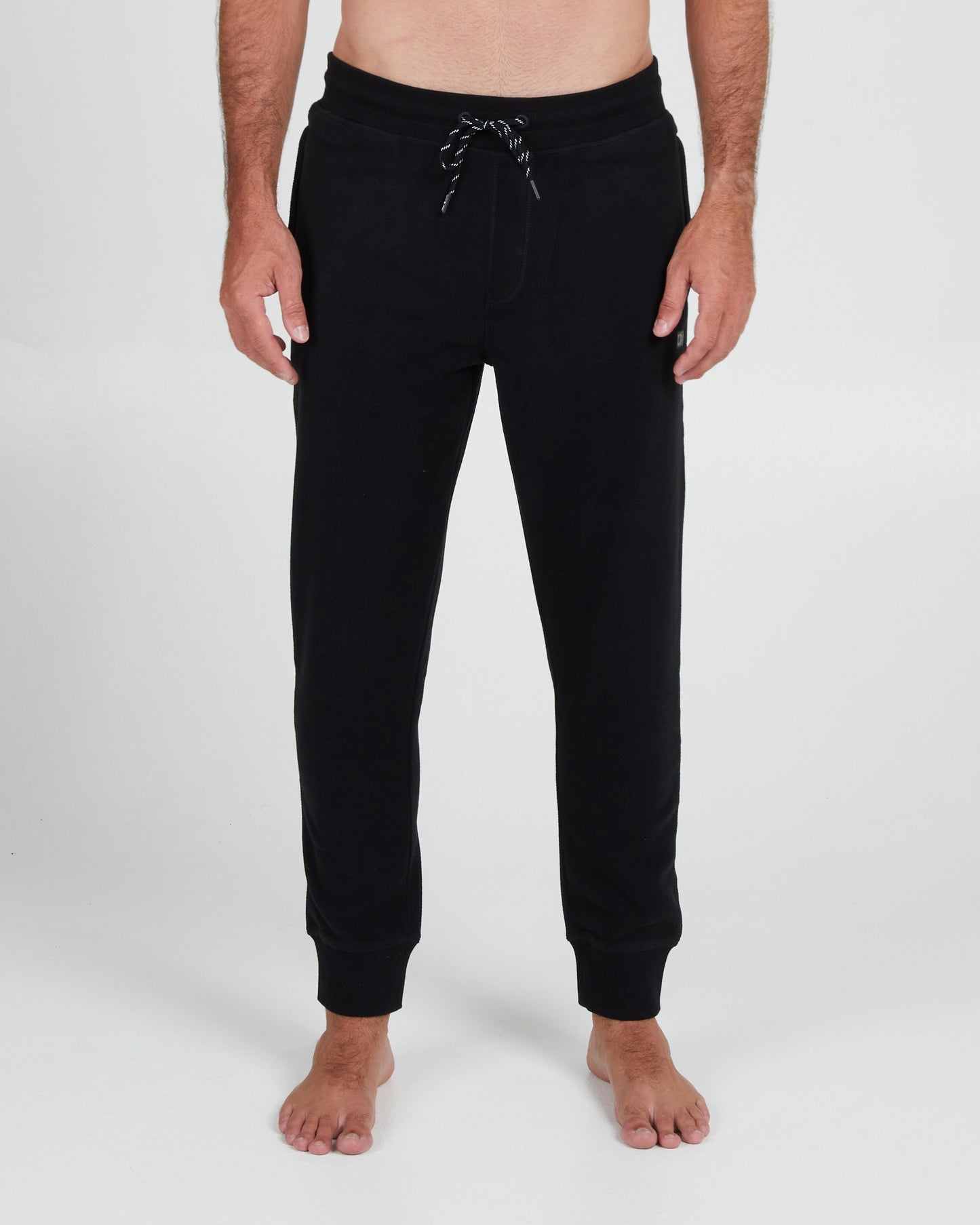 On body front of the Ebbtide Black Polar Fleece Pant
