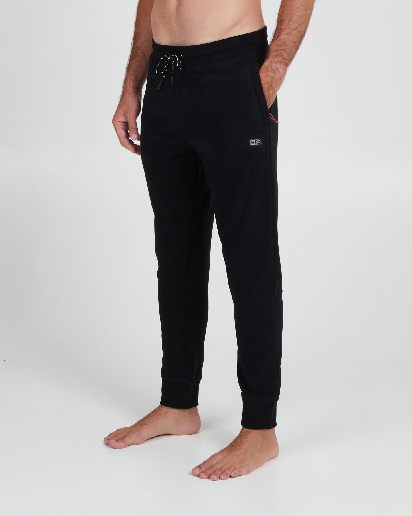 On body front angle of the Ebbtide Black Polar Fleece Pant