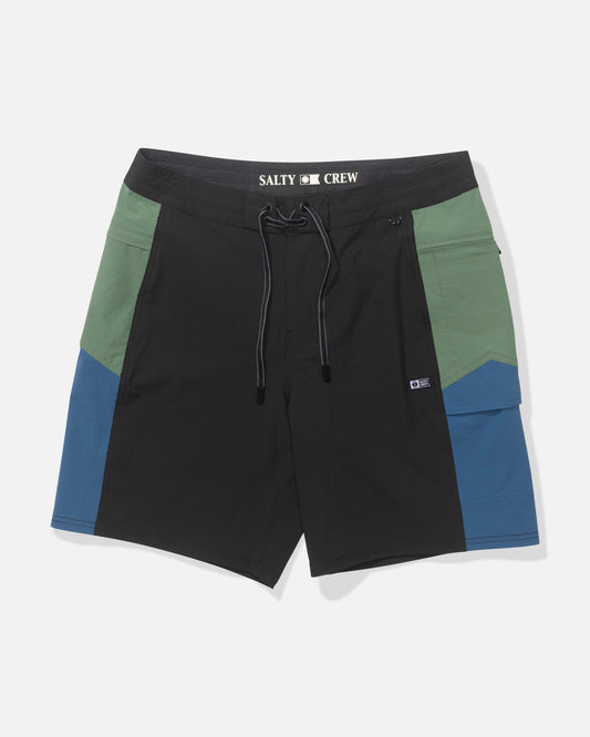 The Salty Crew Flagship 20" Boatshort - Cast Blue features color-blocked 4-way stretch fabric, quick-dry performance, a black SALTY CREW drawstring waist, and a small rectangular patch on the left leg.