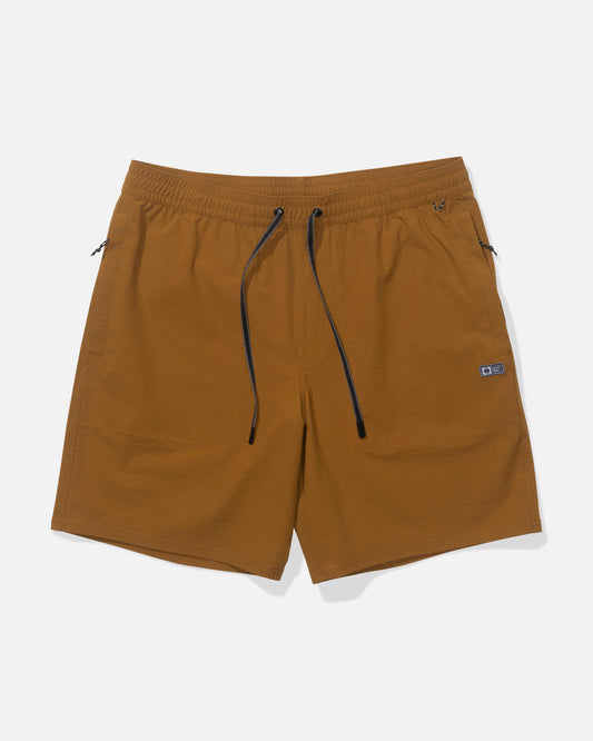 The Salty Crew Crew 18" Boatshort Ewaist in Bronze Brown features black drawstrings, side pockets, a small left-leg logo patch, and is made from quick-dry fabric. Shown flat against a white background.
