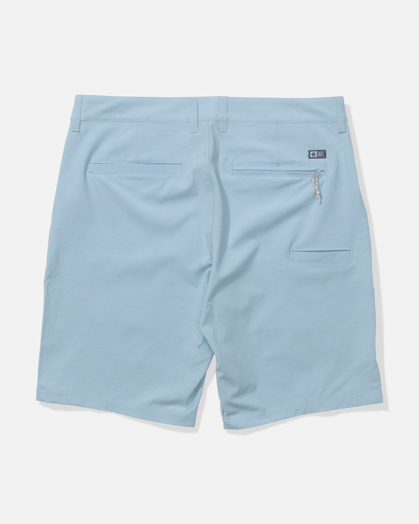 The Salty Crew Drifter 19" Hybrid Short in Mineral Blue features recycled 4-way stretch fabric, belt loops, two back pockets (one zippered), and a small rectangular logo patch above the right pocket. Shown from the back.