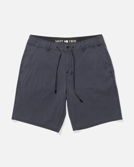 The Salty Crew Transom 19" Overdye Short in Magnet features front pockets, a black drawstring, button closure, inner waistband branding, quick-dry fabric, and 4-way stretch. The shorts are laid flat on a white background.