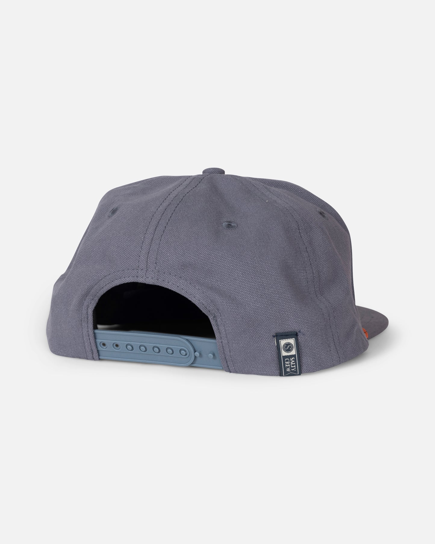 The Salty Crew Coastal Snapback - Hitch Blue is pictured from the back, highlighting its adjustable blue strap and a small black and white fabric tag near the closure. Made from durable cotton canvas, this gray embroidered 5-panel cap combines comfort with classic style.