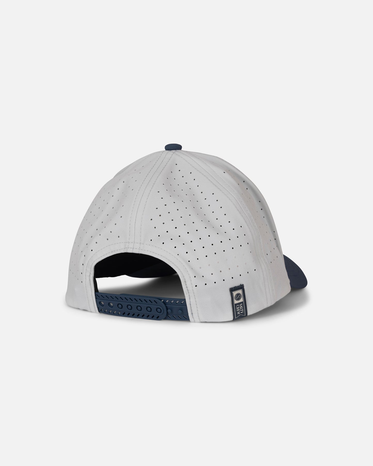 The Salty Crew Lowdown Snapback - Navy/Grey is shown from the back, featuring small ventilation holes, laser-cut panels for enhanced breathability, an adjustable navy snapback closure, and a small rectangular tag on the left side.