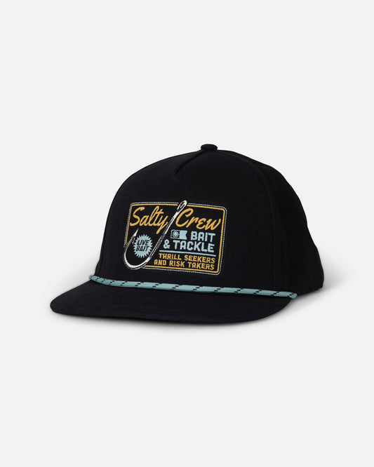 Introducing the Salty Crew Hooked Up Snapback in black—a 5 panel hat featuring an embroidered patch on the front that reads “Salty Crew Bait & Tackle,” “Thrill Seekers and Risk Takers,” along with a fishing hook graphic. This cap is finished with a flat brim and a stylish blue rope accent for added flair.