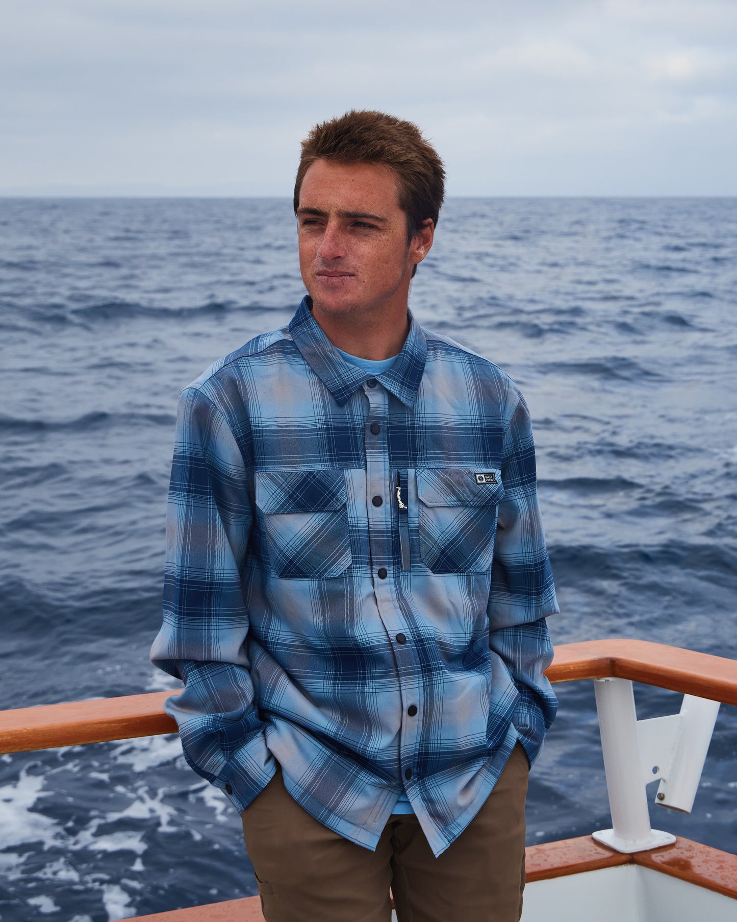 Lifestyle shot of model on boat