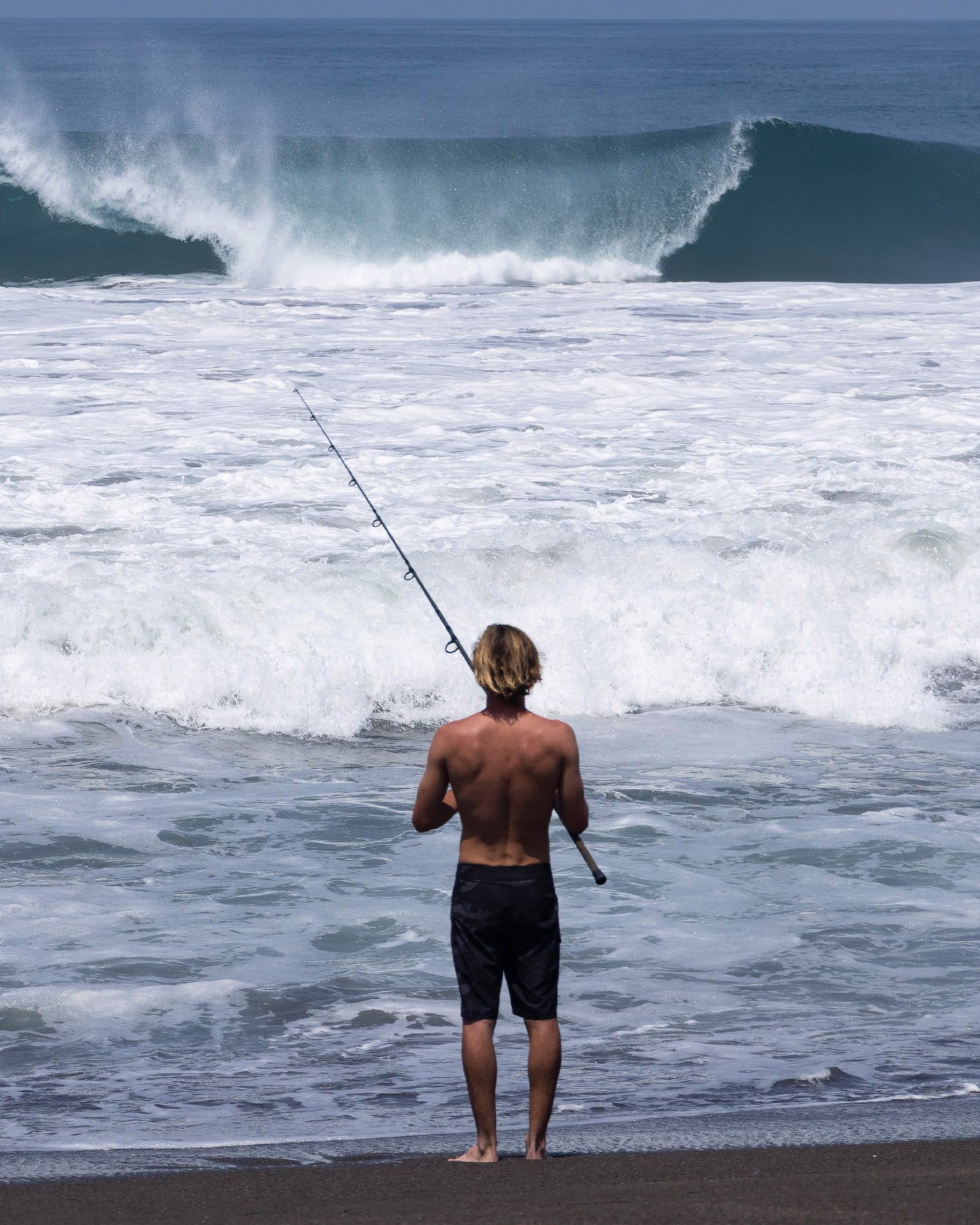 Lifestyle shot of fisher on the waters edge