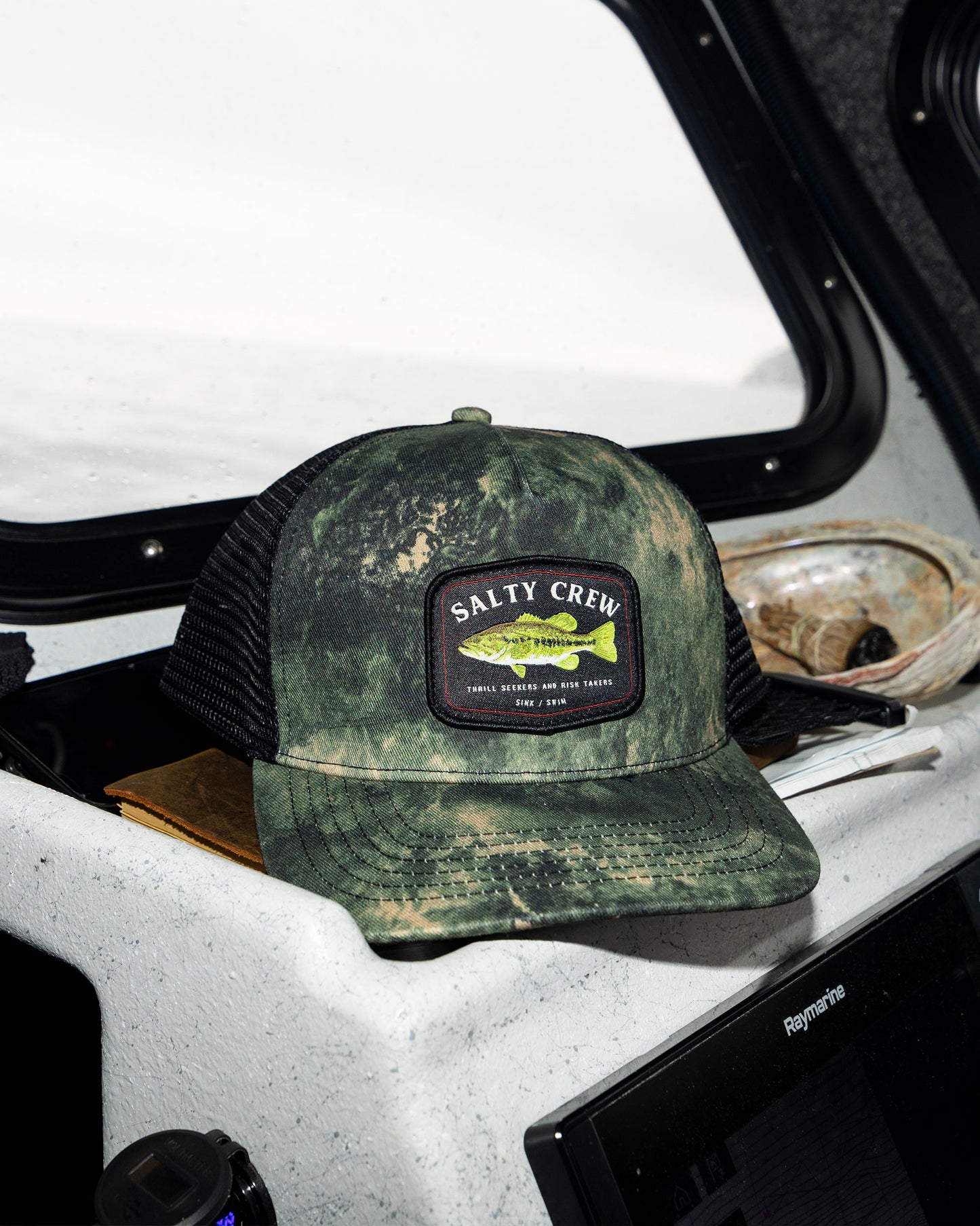 Lifestyle shot of the Bigmouth Trucker Hat - Deep Forest.