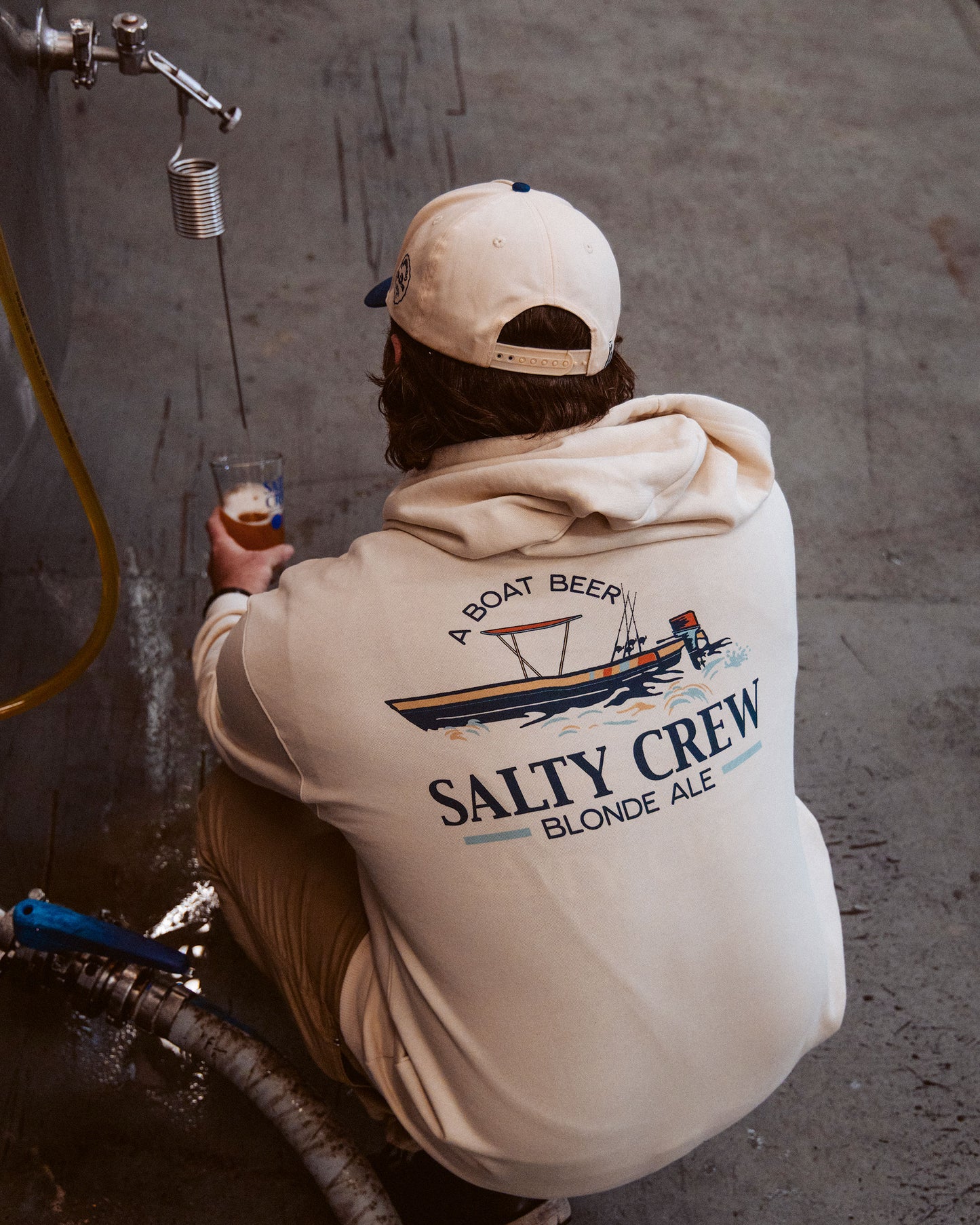 Candid shot of the Salty Brew Fleece Hoodie - Bone.