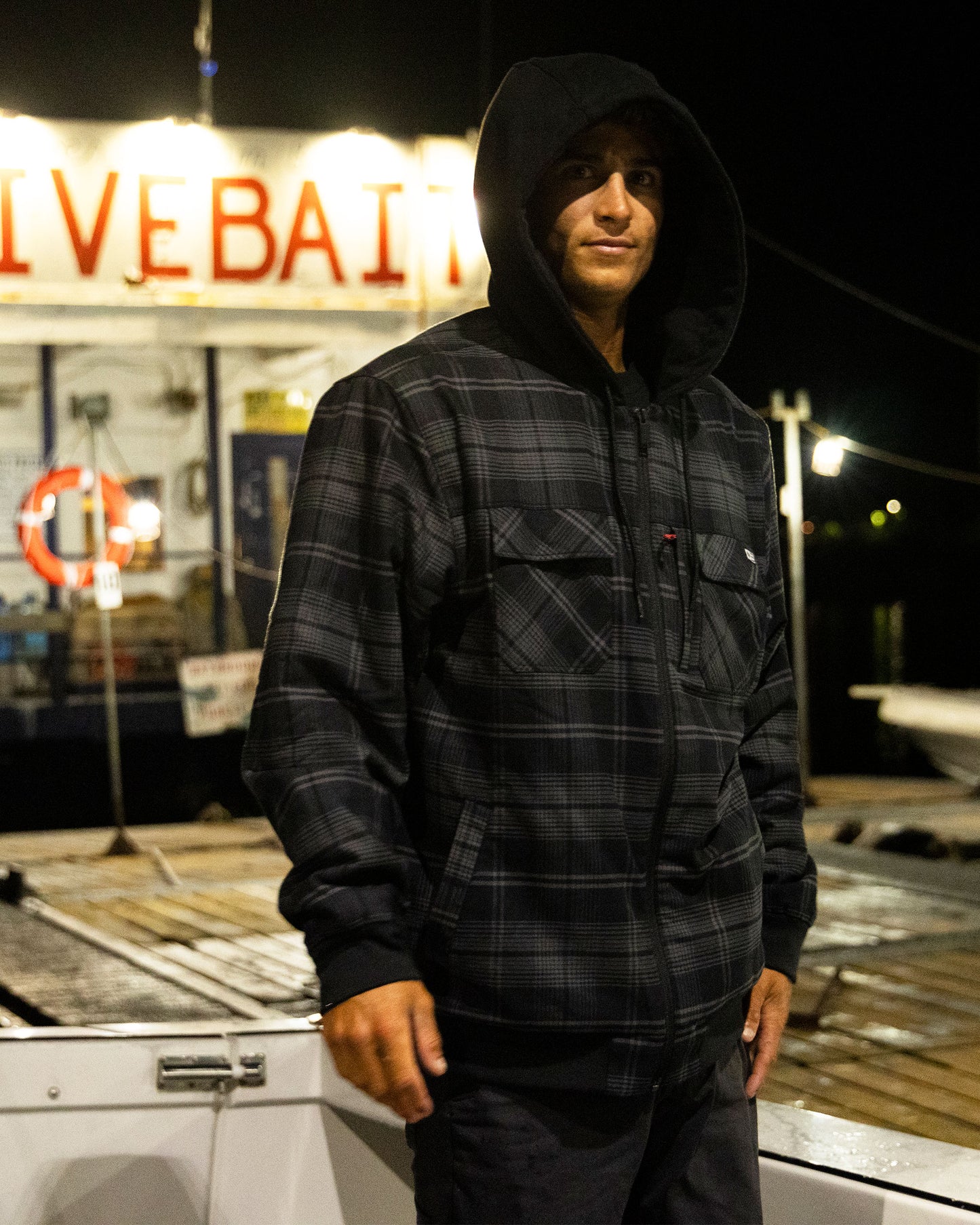 Lifestyle shot of the Fathom Jacket - Black.