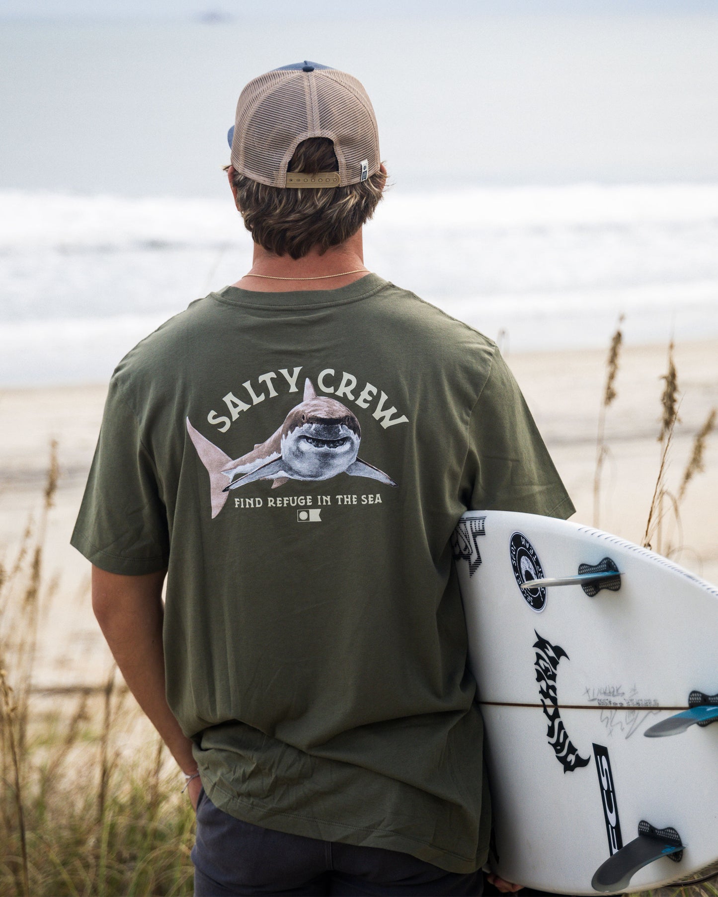 On-body back view of the Lurking Tee - Dusty Olive.