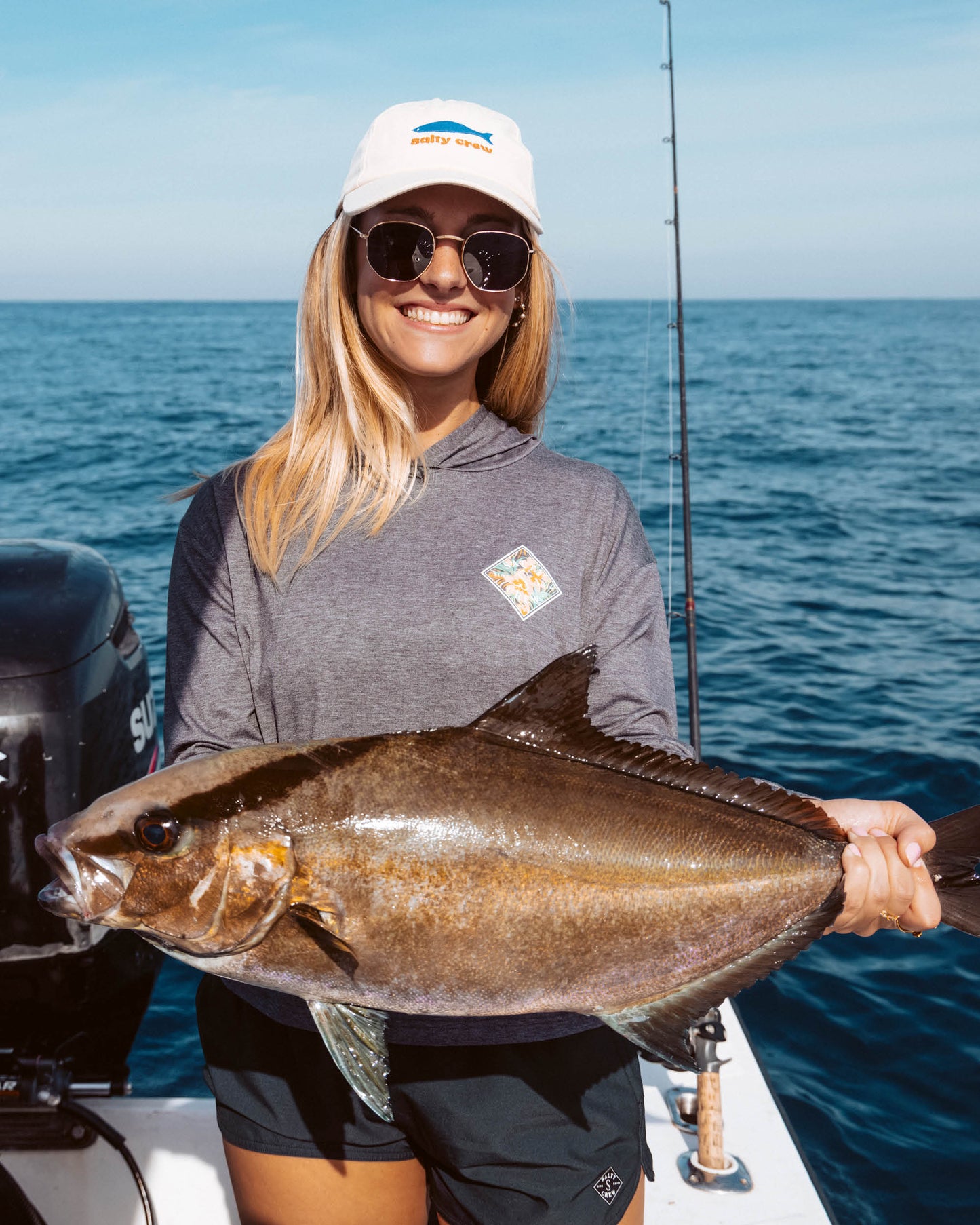 Lifestyle shot of the Fresh Catch Dad Hat - Off White.