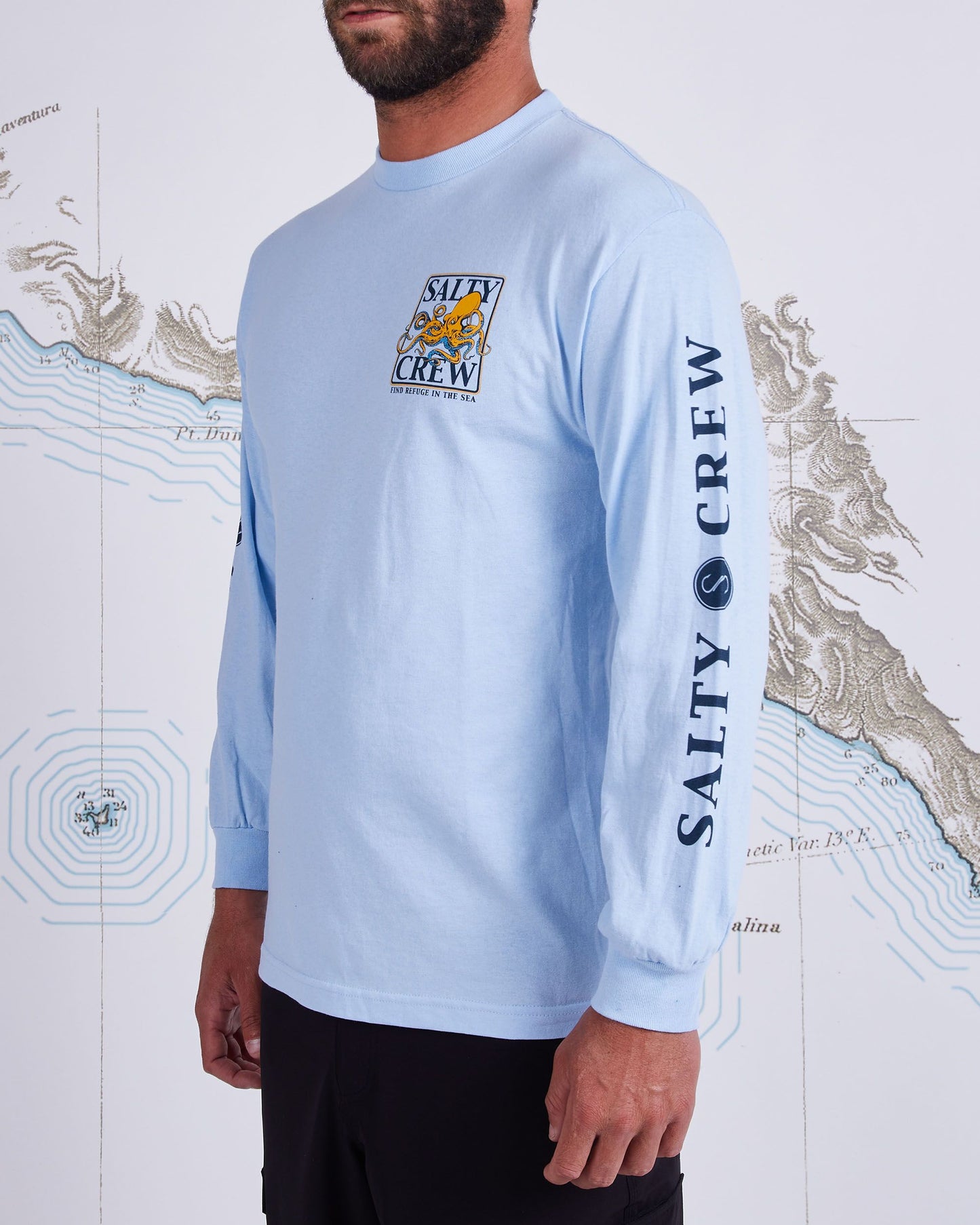 On body front angled of Ink Slinger Light Blue L/S Standard Tee