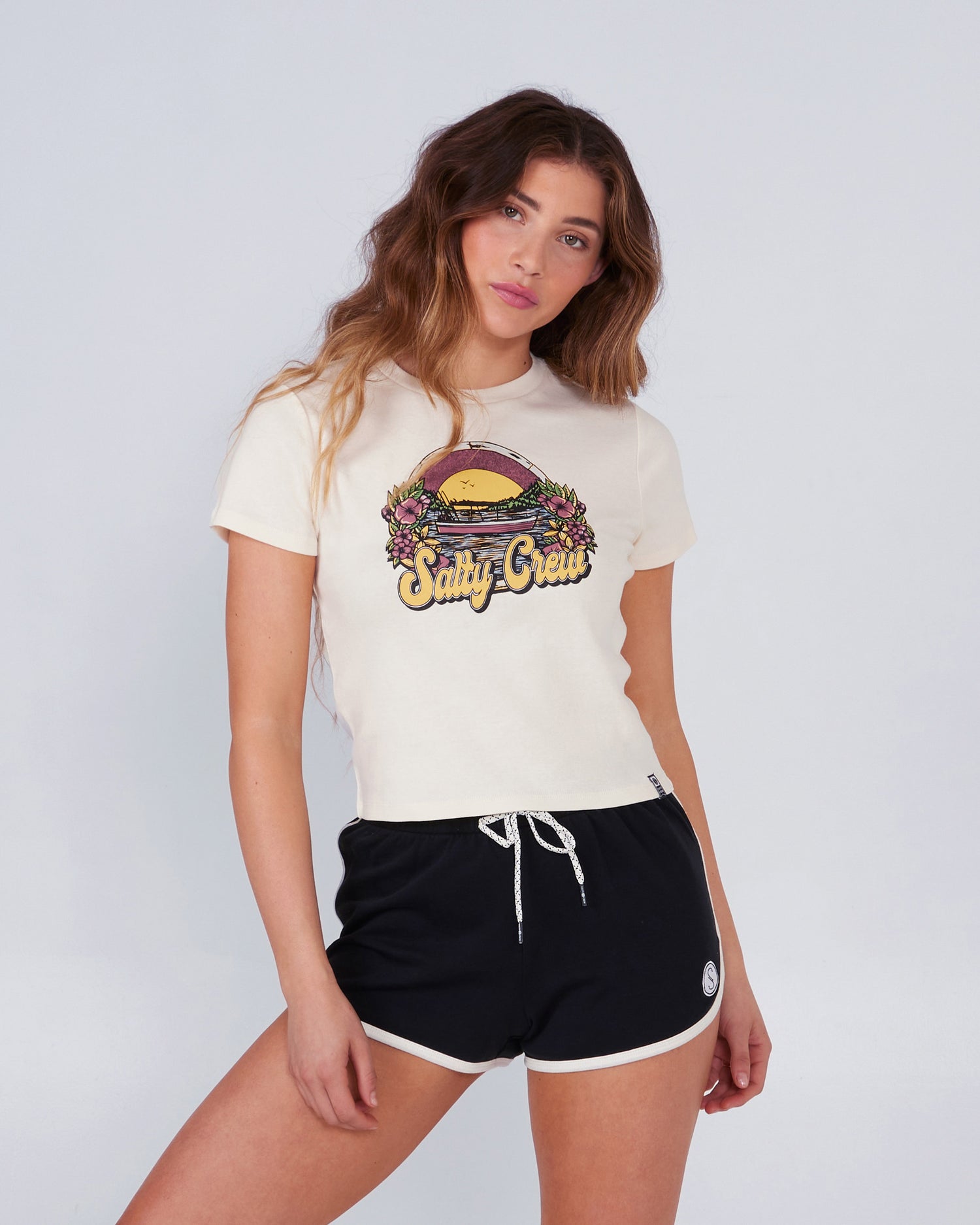 front view of On Vacation Bone Baby Tee
