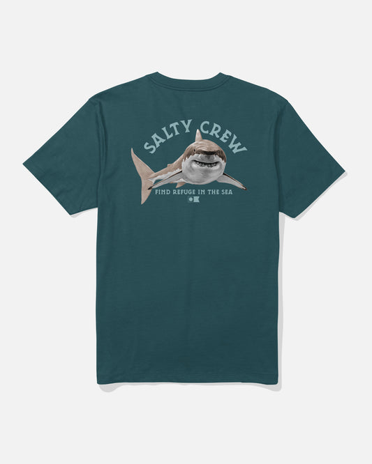 The Salty Crew Lurking Crew Tee in Atlantic Blue is crafted from soft, combed ringspun cotton for all-day comfort. This tee features a screenprinted shark graphic on the back, with “SALTY CREW” above and “FIND REFUGE IN THE SEA” below, all centered for a bold statement.