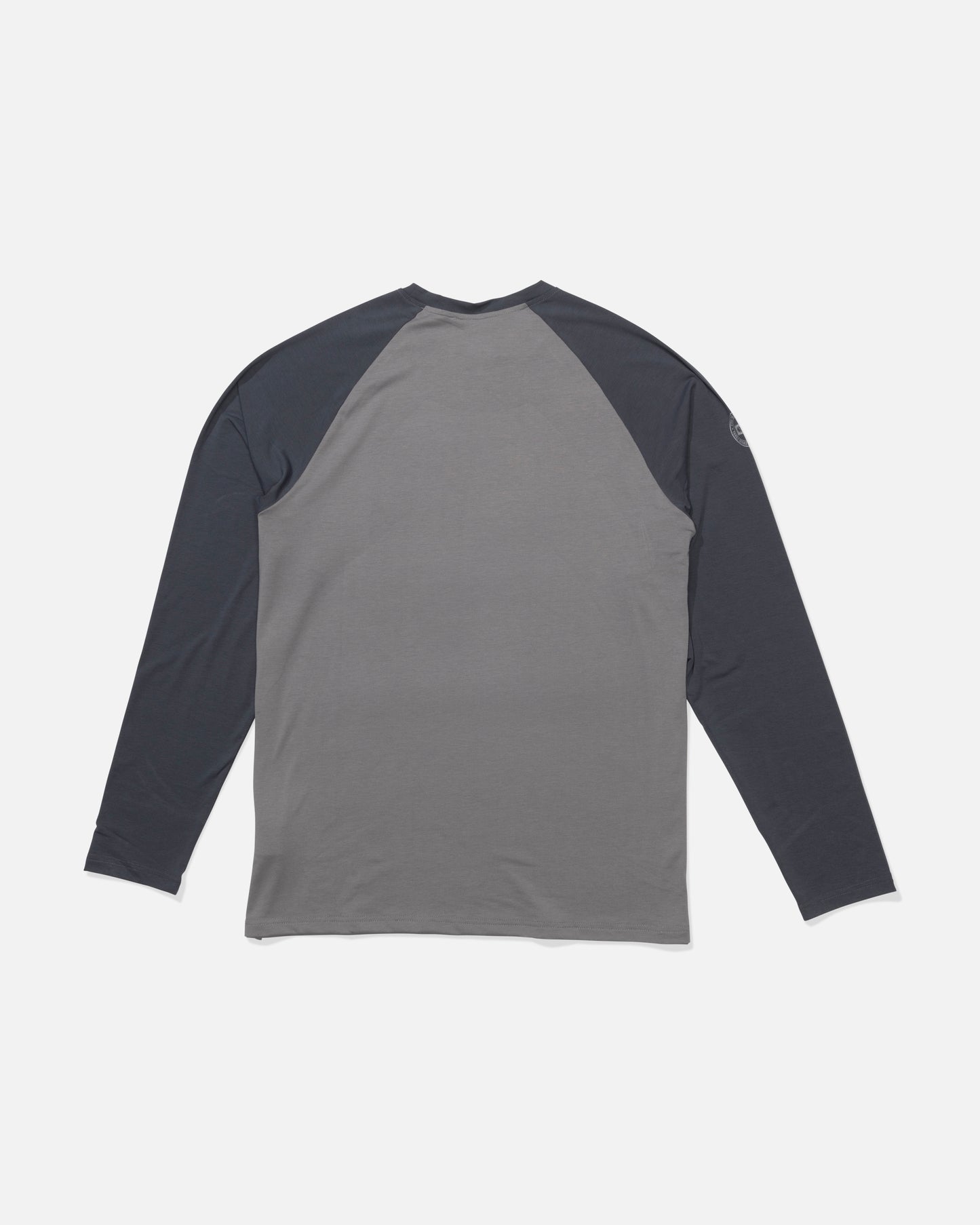 The Salty Crew Mariner Lite UV Sunshirt - Magnet is shown from the back with a two-tone design: light gray body, dark gray sleeves, and technical knit fabric for superior moisture wicking on a plain white background.