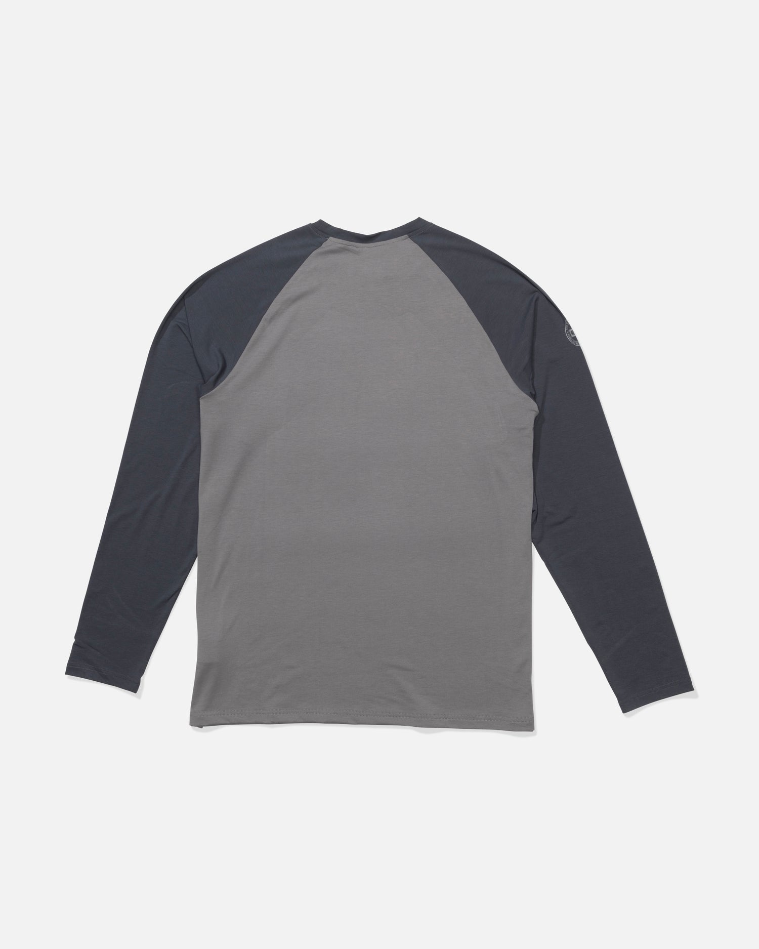 The Salty Crew Mariner Lite UV Sunshirt - Magnet is shown from the back with a two-tone design: light gray body, dark gray sleeves, and technical knit fabric for superior moisture wicking on a plain white background.