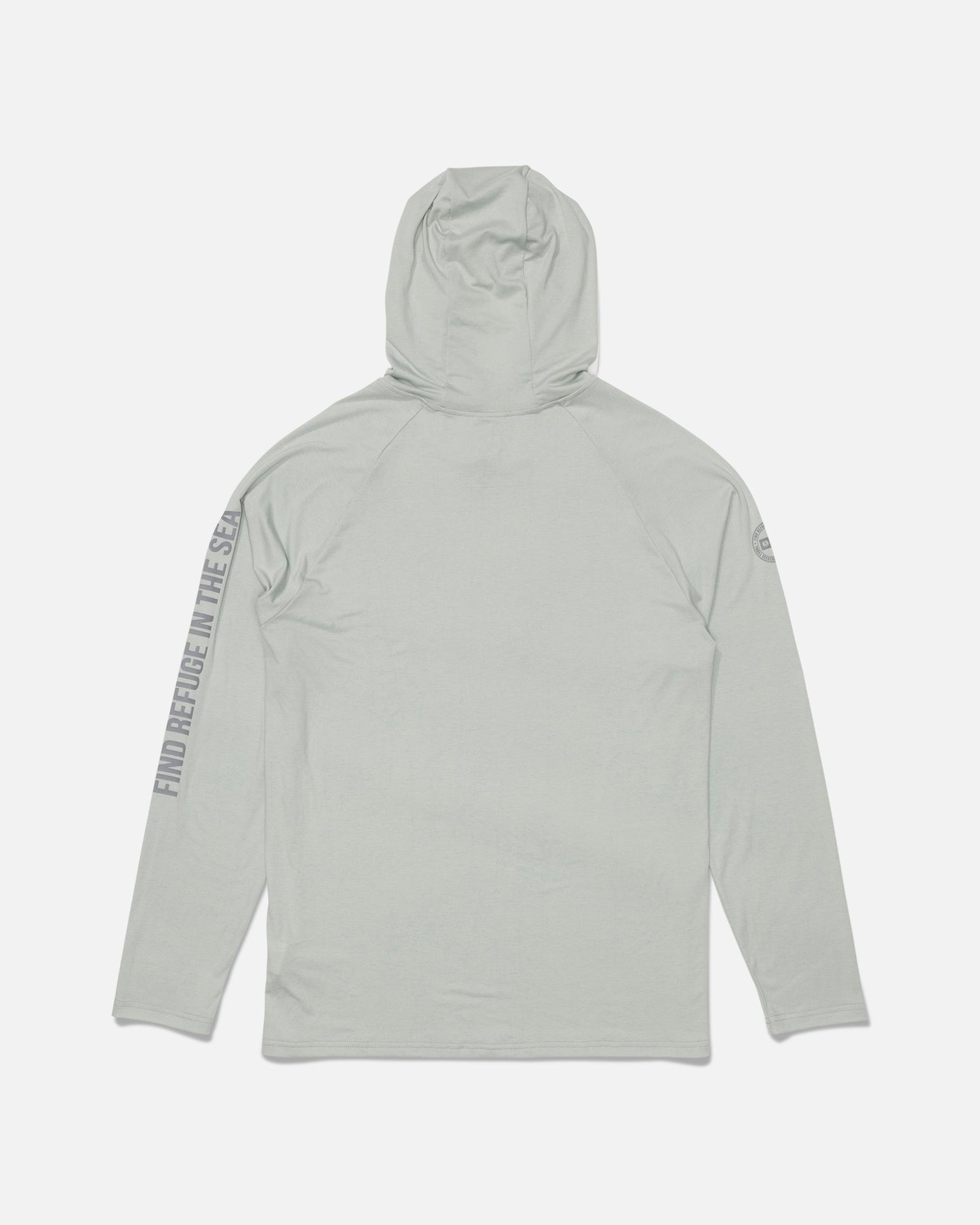 The Salty Crew Mariner Lite UV Hood in Aqua Grey is a light gray long-sleeve hooded shirt made from recycled polyester with UPF 50+ sun protection. “FIND PEACE IN THE SEA” is printed vertically along the right sleeve, and this image shows the back of the shirt.