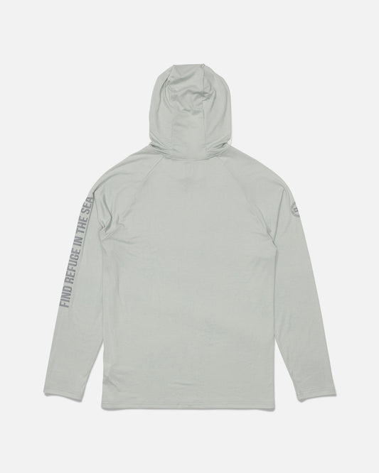 The Salty Crew Mariner Lite UV Hood in Aqua Grey is a light gray long-sleeve hooded shirt made from recycled polyester with UPF 50+ sun protection. “FIND PEACE IN THE SEA” is printed vertically along the right sleeve, and this image shows the back of the shirt.