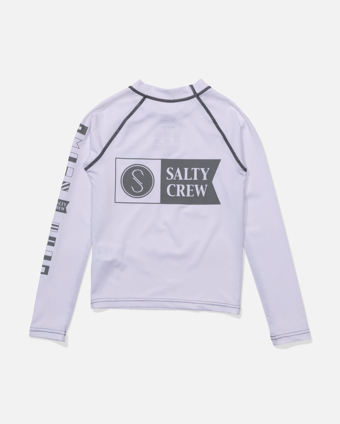 The Salty Crew Alpha Boys Rashguard in white features long sleeves, black seams, a large Salty Crew logo on the back, and small black icons along the right sleeve.