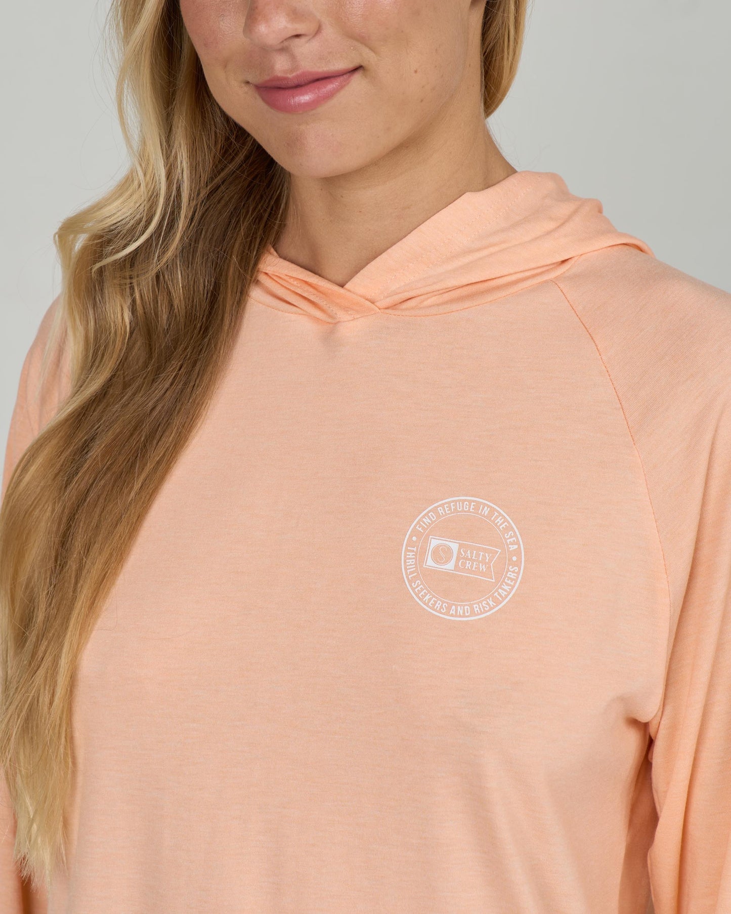 Close up front view of the Circled Tech Hoody - Apricot. 