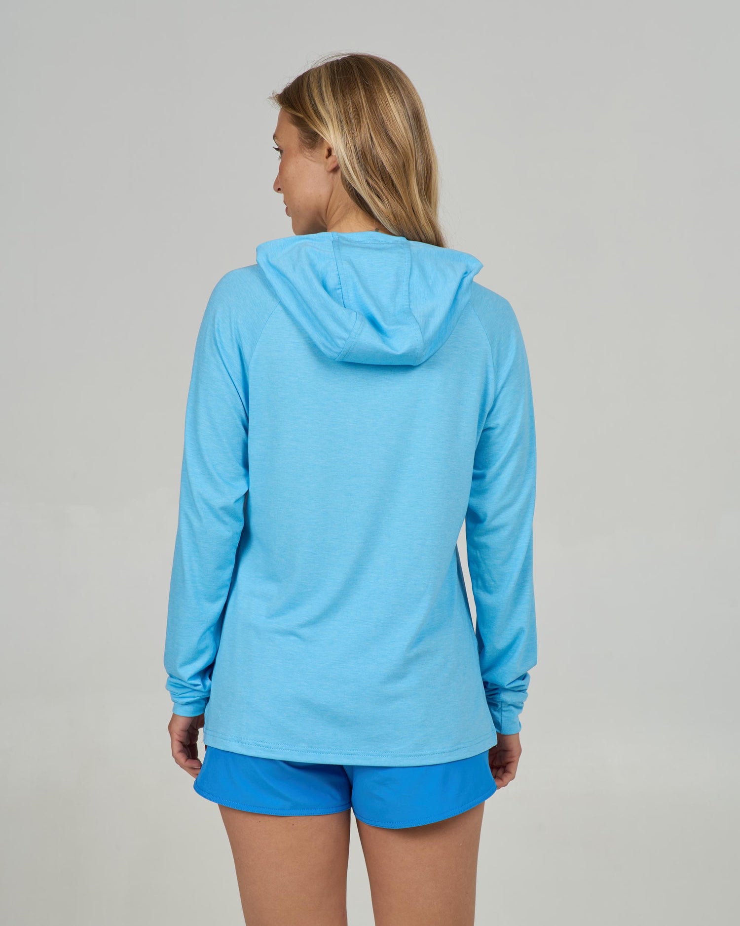 Back view of the Circled Tech Hoody - Pool Blue. 