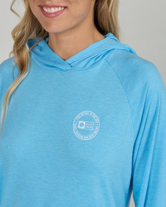 Close up view of the Circled Tech Hoody - Pool Blue. 