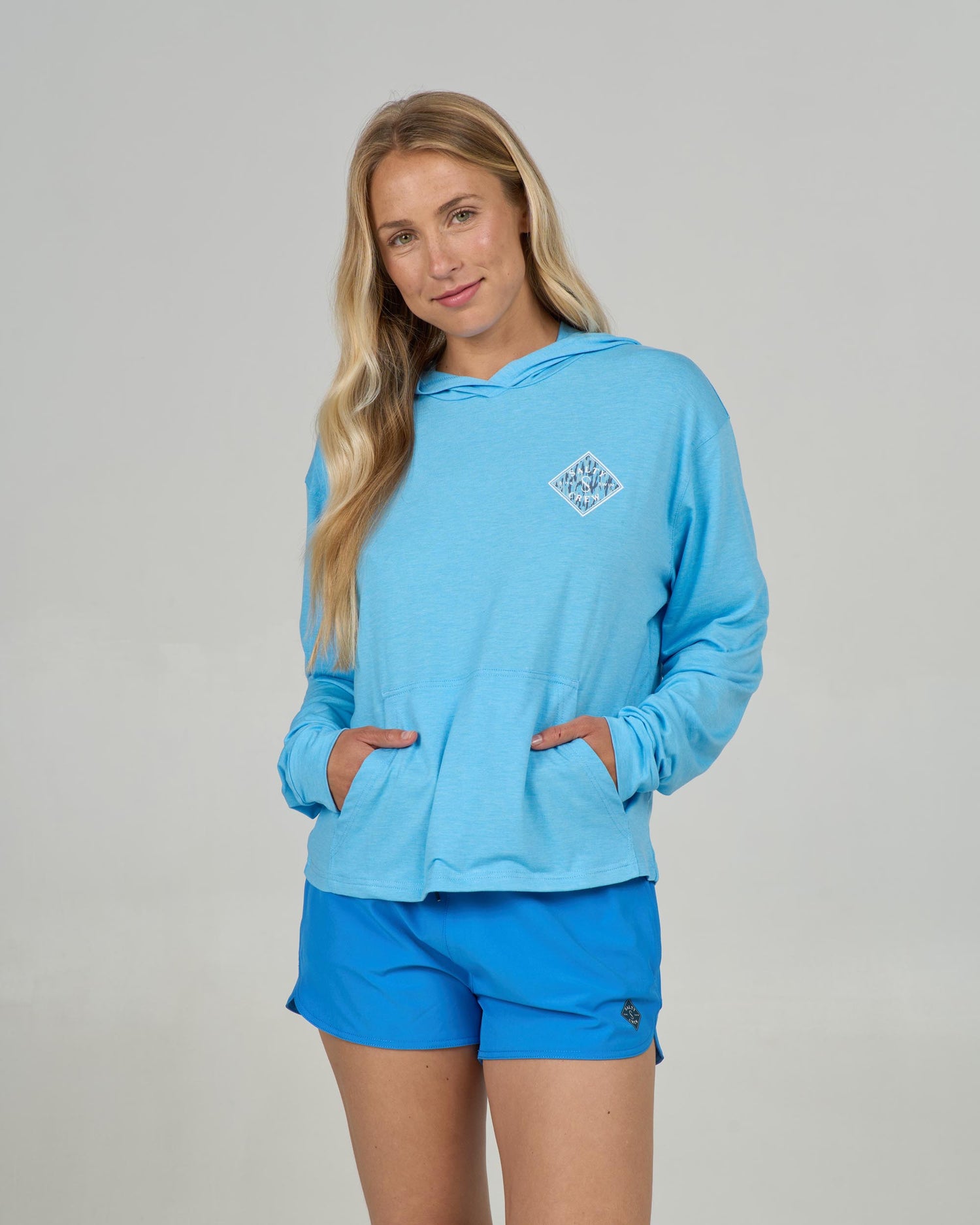 Front view of the Tippet Fill Tech Hoody - Pool Blue. 