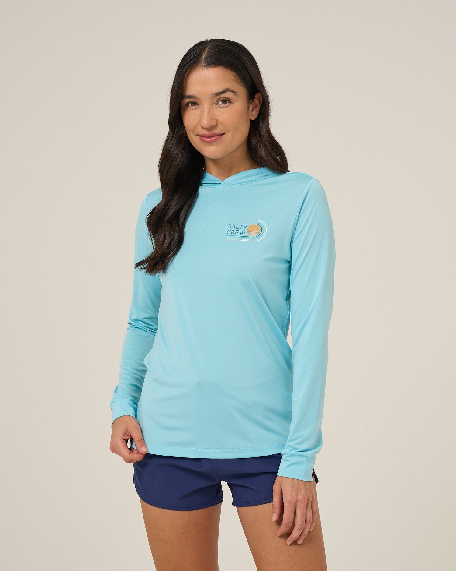 Front view of the Ombre Wave Hood Sunshirt - Aquamarine. 