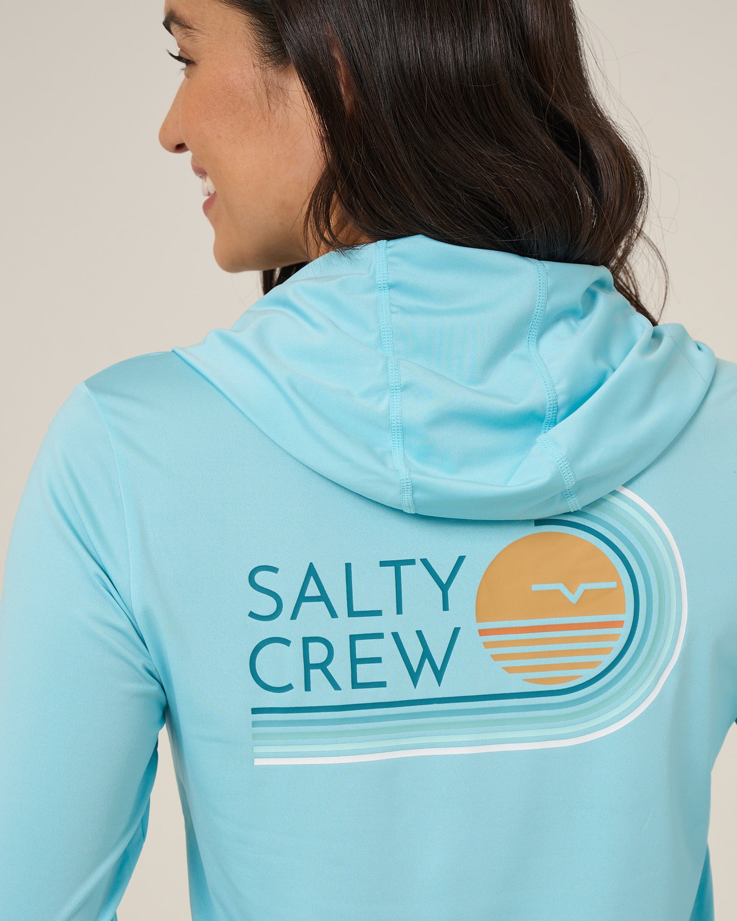 Close up back view of the Ombre Wave Hood Sunshirt - Aquamarine. 