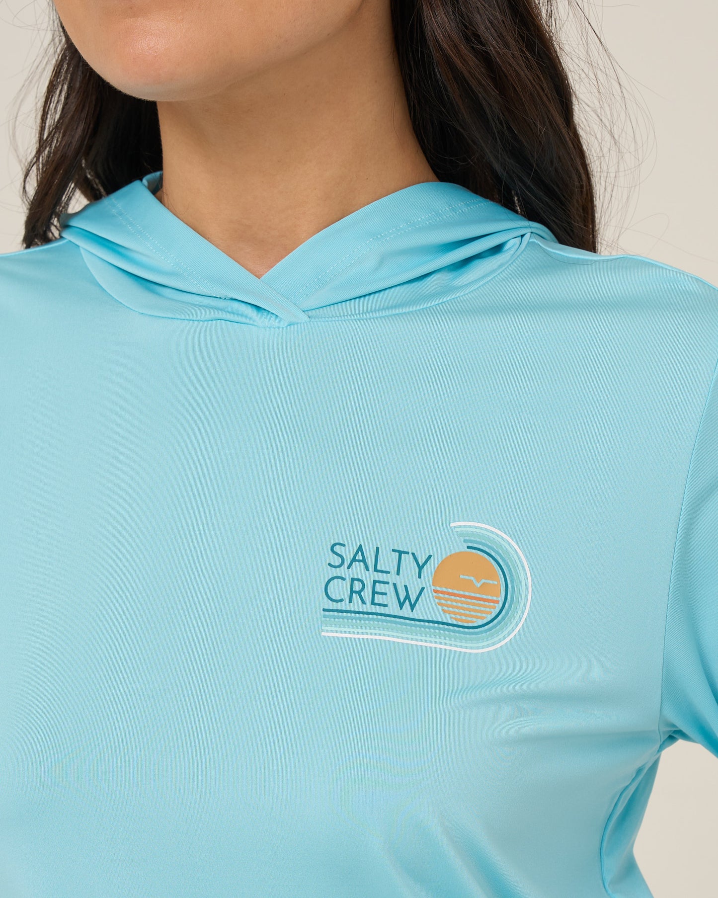Close up front view of the Ombre Wave Hood Sunshirt - Aquamarine. 