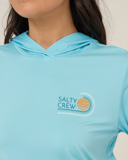 Close up front view of the Ombre Wave Hood Sunshirt - Aquamarine. 