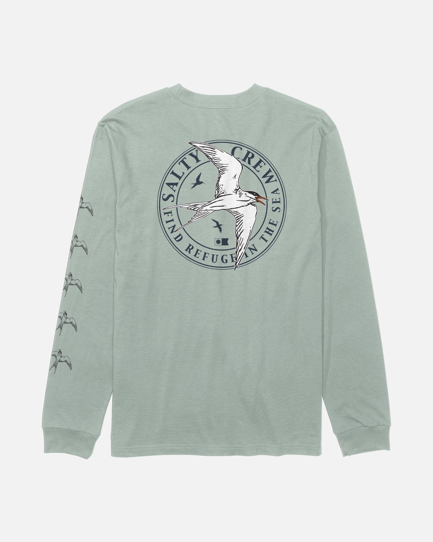 The Salty Crew Tern Long Sleeve Tee in Aqua Grey is a soft, combed ringspun cotton shirt with long sleeves. The back displays a circular “Salty Crew: Find Refuge in the Sea” logo featuring a flying tern, screenprinted for lasting quality. Smaller tern graphics are printed down the left sleeve, adding extra detail to this comfortable tee.