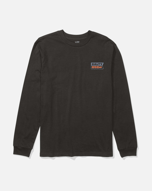 The Inverse Flag Boys Long Sleeve Tee in black by Salty Crew is a combed ringspun cotton shirt featuring a small blue, orange, and white Salty Crew logo screenprinted on the upper left chest. The long-sleeve tee is displayed laid flat on a white background.