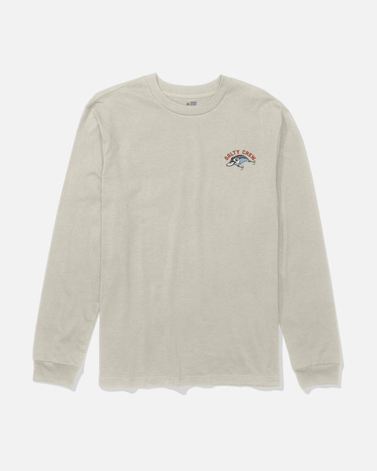 The Catch Me Boys Long Sleeve Tee in Bone by Salty Crew features a light beige color and a small screenprinted Salty Crew logo with a fish graphic on the left chest. Crafted from soft combed ringspun cotton, this long-sleeve t-shirt is shown laid flat on a white background.