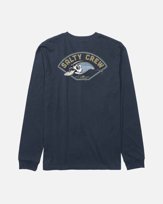 The Catch Me Boys Long Sleeve Tee by Salty Crew is a navy blue, combed ringspun cotton t-shirt featuring a screenprinted fish graphic and Salty Crew text on the back.